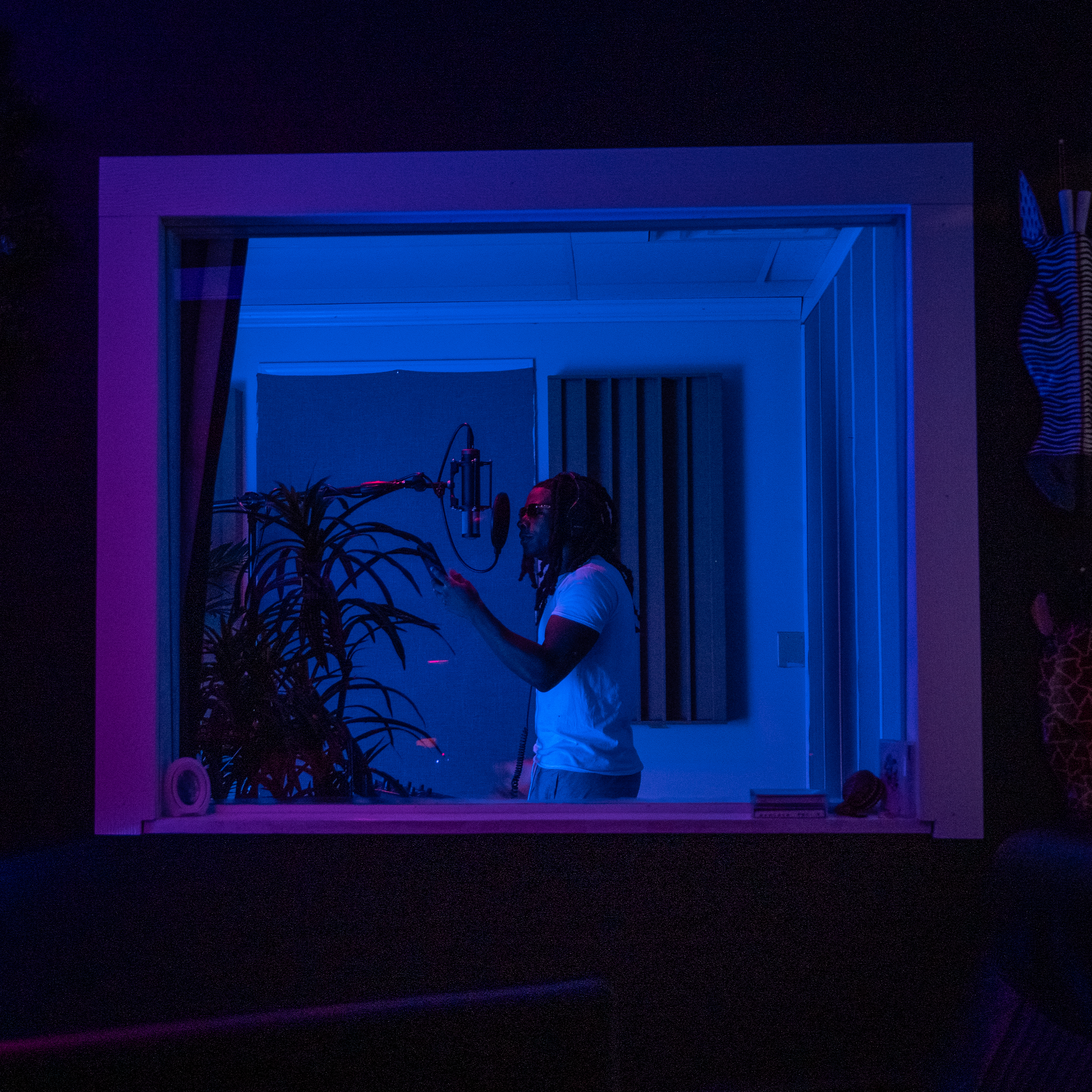 Natural light through the studio window setting the mood for emotional music