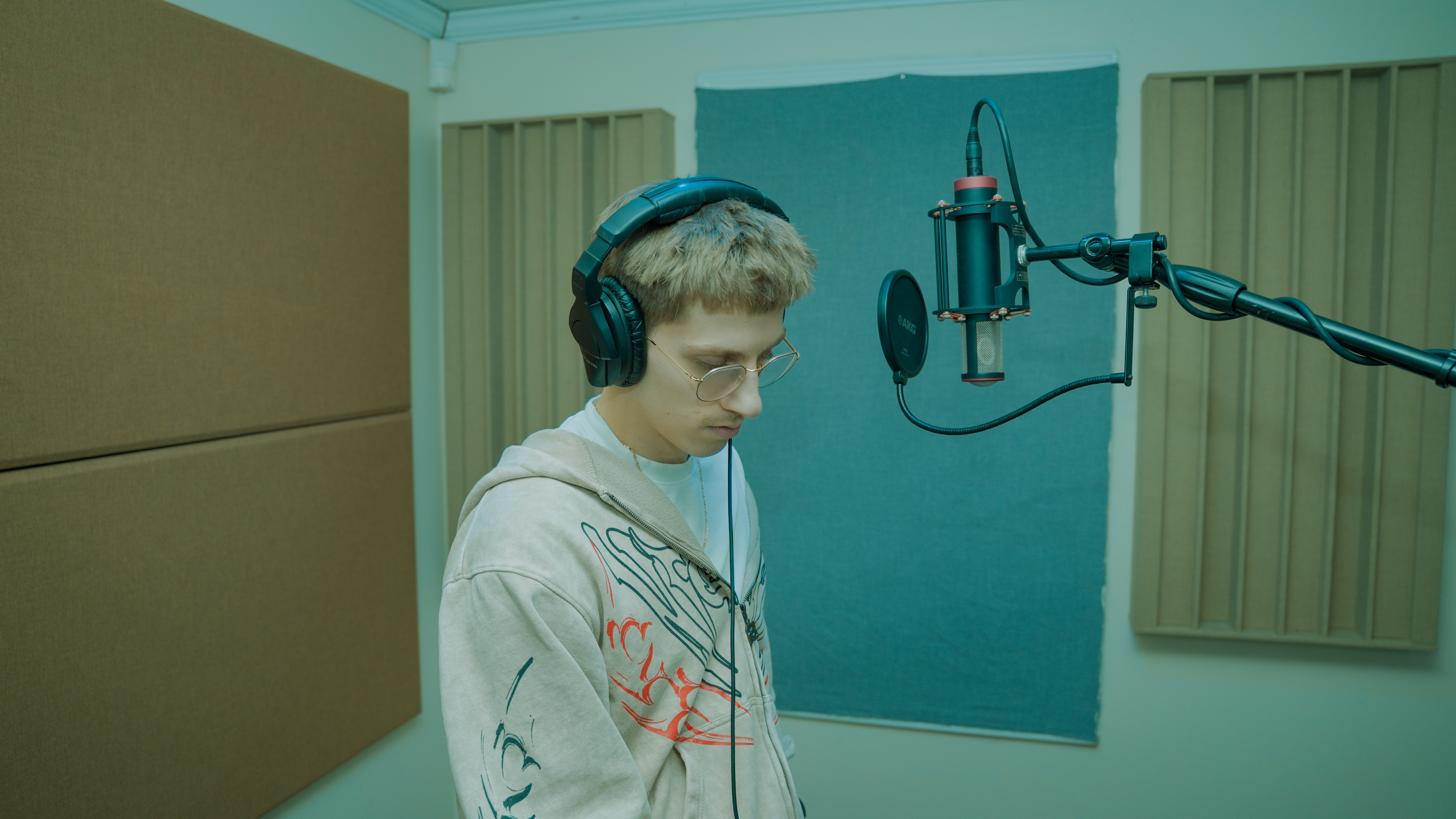 Artist performing in the booth exploring keys and signatures