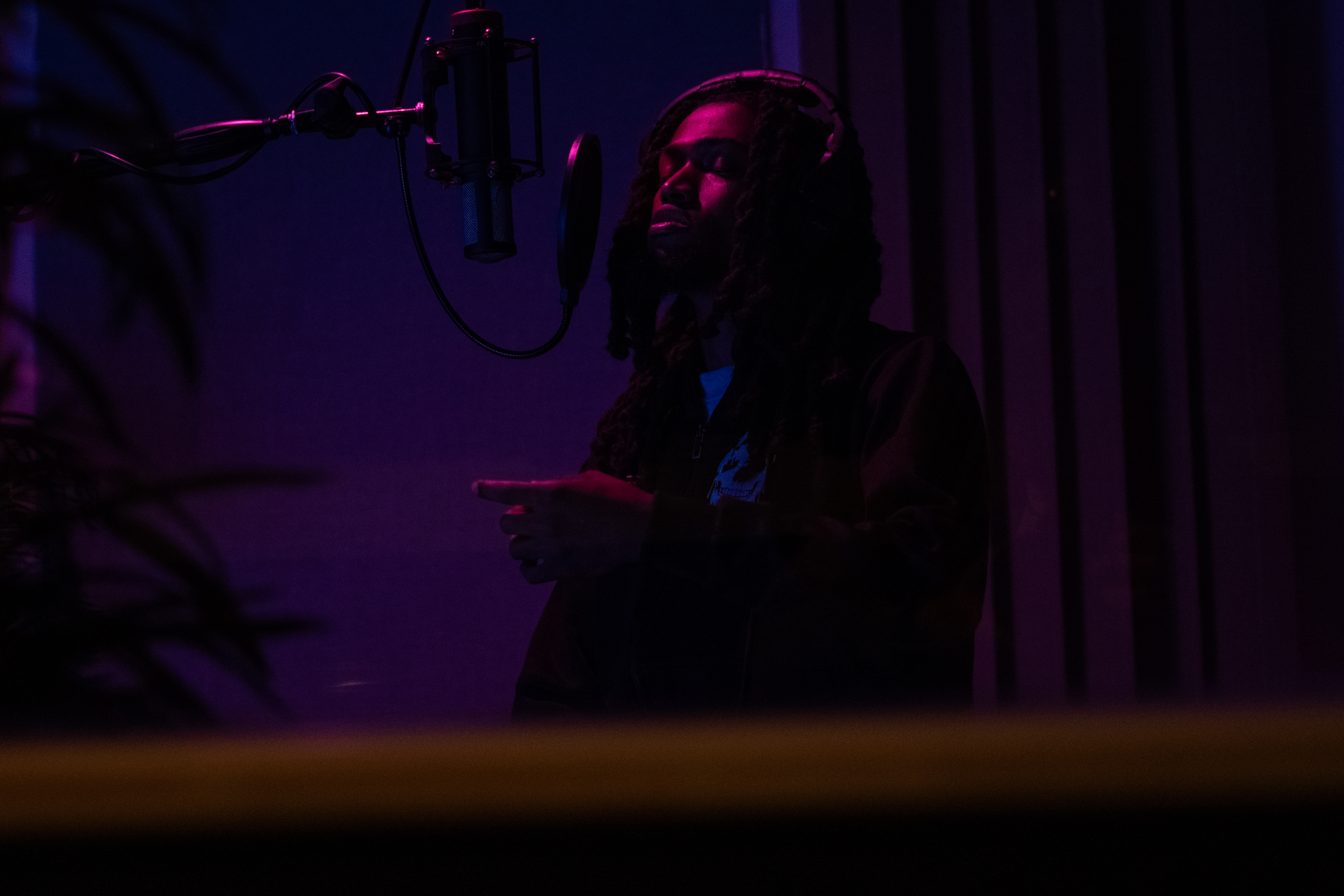 Wide view of the vocal booth where rhythm drives every session